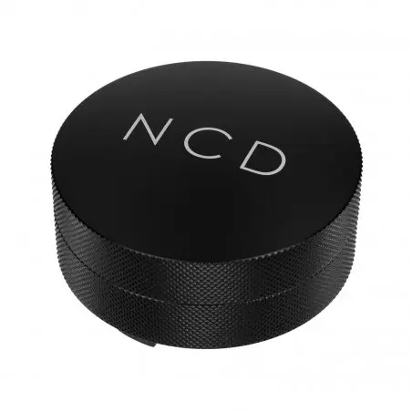 Nucleus distributor na kávu v černé barvě.