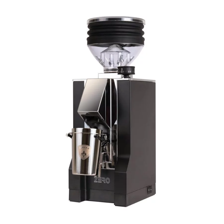 Černý elektrický mlýnek na kávu Eureka Mignon Zero s chromovým výdejníkem.