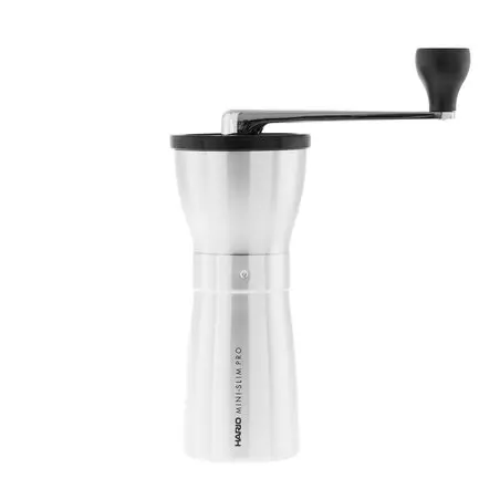 Ruční mlýnek na kávu Hario Mini Mill Slim Pro ve stříbrné barvě, vyrobený z odolné nerezové oceli.