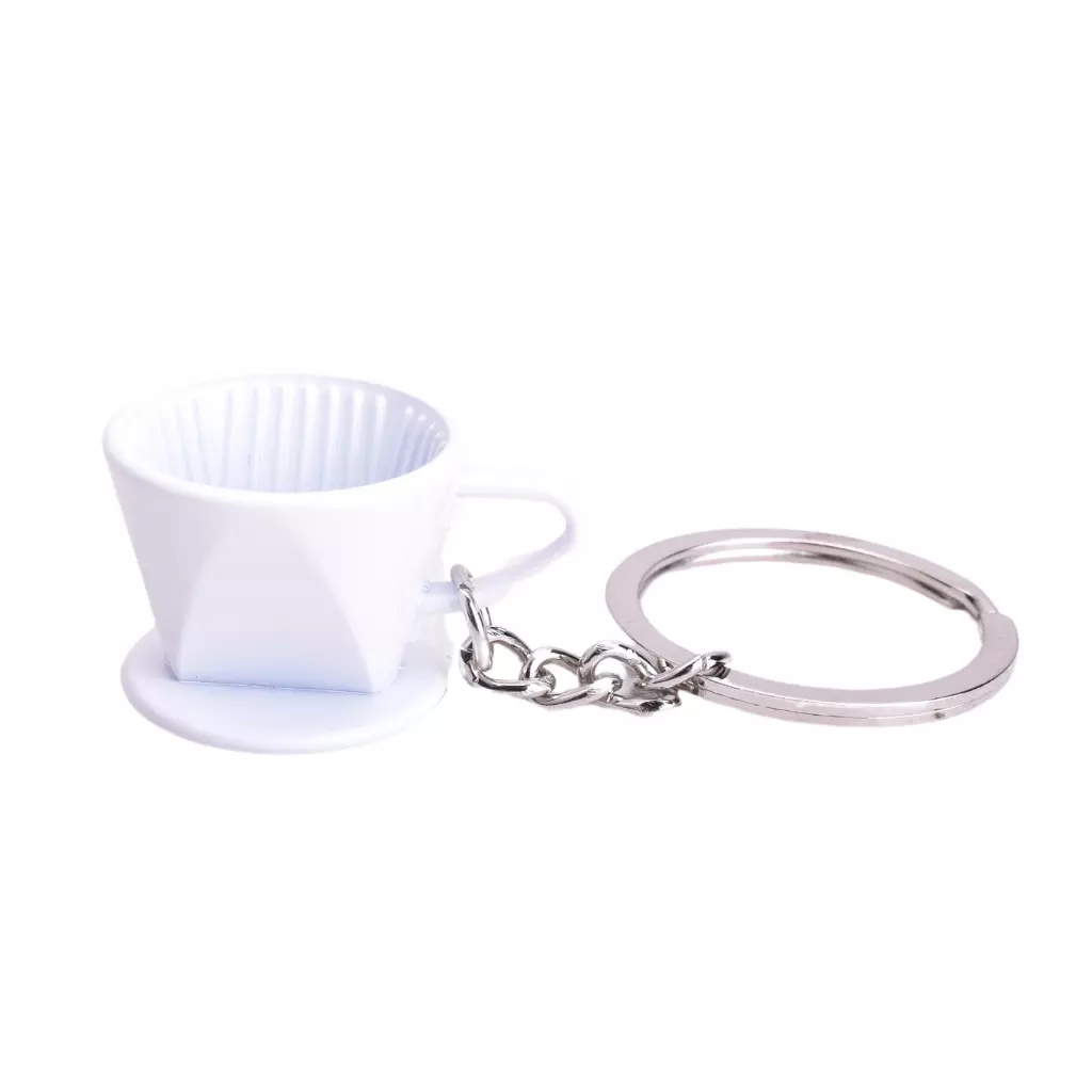 Bílý dripper jako přívěsek na klíče od značky JoeFrex. Bílý dripper jako přívěsek na klíče od značky JoeFrex.