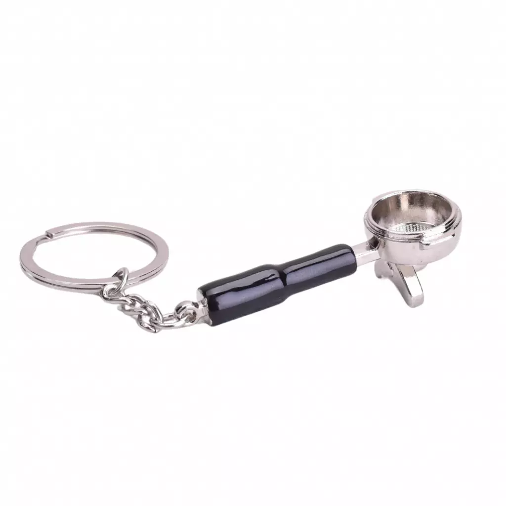 Mini portafilter s černou rukojetí jako přívěsek na klíče od značky JoeFrex. Mini portafilter s černou rukojetí jako přívěsek na klíče od značky JoeFrex.