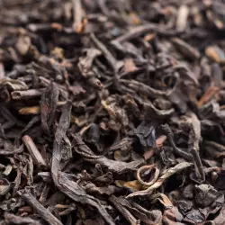 BIO Pu Erh Tea od značky Green Plantation je fermentovaný čaj s doporučenou dávkou 12 g na litr, ideální pro milovníky kvalitních čajových zážitků.
