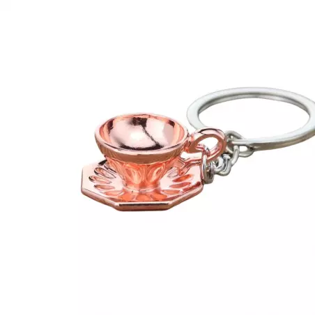 Přívěsek na klíče ve tvaru růžového šálku na kávu od značky Coffea je ideálním dárkem pro milovníky kávy.