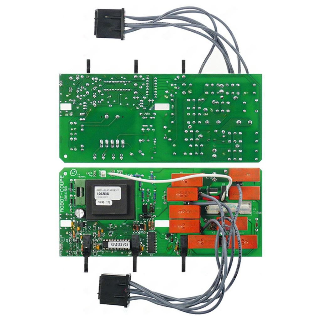 Dvojice zelených desek plošných spojů s konektory a svazky vodičů, řídicí elektronika sekáčku 190x83 mm